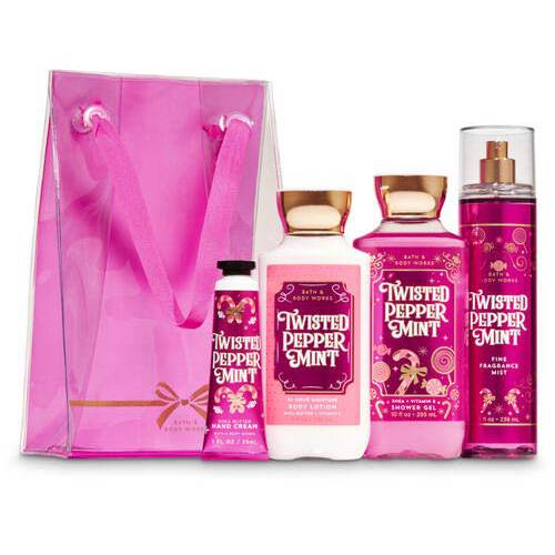 Bath and Body Works Twisted Peppermint Gift Bag Set, Full Size Body Lotion, Shower Gel, Fragrance Mist and 1 oz Hand Cream arranged inside a transparent Gift Bag.